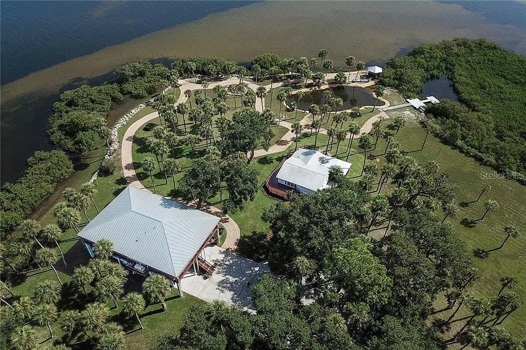 Aerial view of the Beach House — the estate on its Pine Island peninsula, Gulf of Mexico on three sides